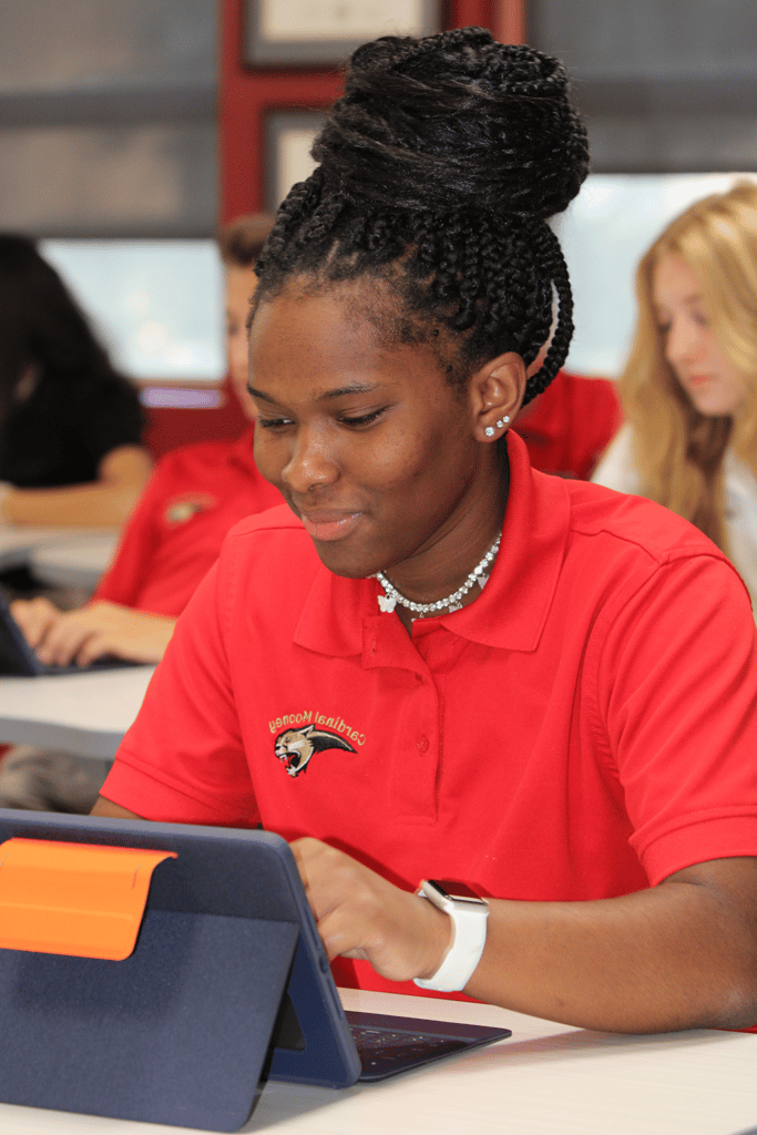 Female black student using ipad